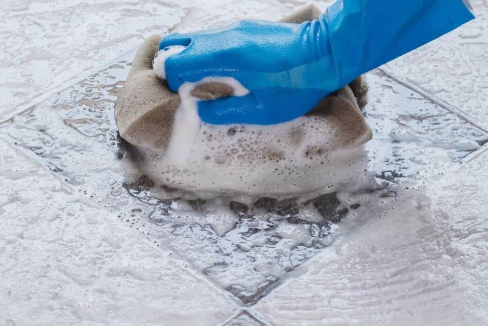 manual cleaning the tiles